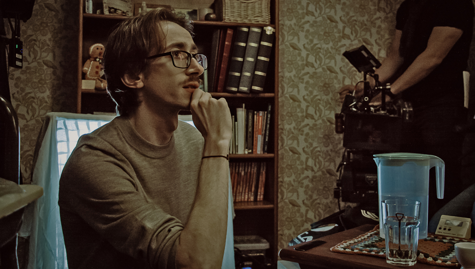 Man staring at digital camera